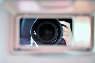 Shallow focus photography of camera lens