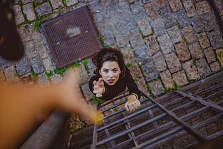 A woman trying to catch a man’s hand in Zyphar Animas story.