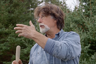 Rick Lagina gestures while explaining something, in The Curse of Oak Island.
