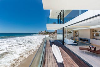 Living area and deck. Architecture and interior design by Mark Dziewulski Architect. Photography by Nico Marques.