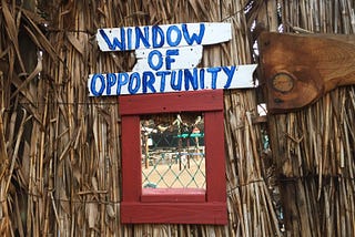 A picture with the words “Window of Opportunity” written above a small window.