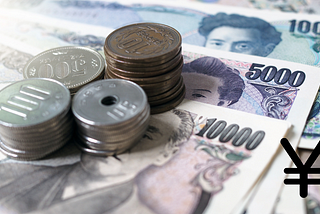 A close-up of Japanese coins and notes.