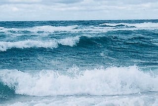 Cold Blue Ocean Waves Rolling Offshore.