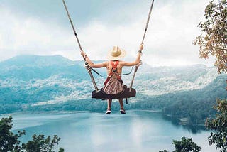 girl swinging on a swing