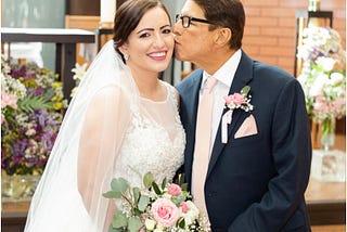A photo of me and my dad on my wedding day.