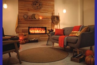 Cosy living room with candles and decorated in autumn colours