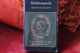 A photograph of a copy of ‘Middlemarch’ by George Eliot, propped against a cushion on a sofa. Image credit: Taryn Parker-Holmes (author)