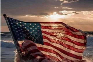 American flag flows over the ocean with a caption underneath