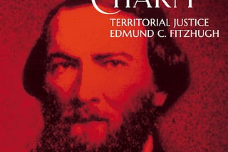 A book cover is shown with a reproduction of an old photograph with a red filter. The portrait photo is of a man with medium length hair and a bushy mustache and beard. He appears to be wearing a shirt and jacket and looks directly into the camera. The title of the book appears at top in white text and reads, “Man of Treacherous Charm: Territorial Justice Edmund C. Fitzhugh.” The author’s name is at bottom in white text and reads, “Candace Wellman.”