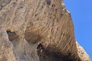 Climber on overhanging rock