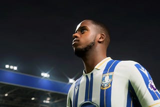 Sheffield Wednesday left back Ryan Sessegnon stands on the pitch at the Hillsborough Stadium shortly before kickoff.