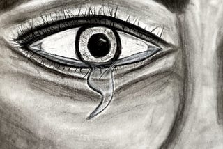 Charcoal drawing by Author. Drawing is intended to highlight the suicide prevention symbolic semi-colon. The semi-colon represents the continuation of one’s story/life rather than the finality of a period. The drawing is of an eye is in shades of black and white. The eye is wide, pupil dilated as the top of the semicolon, with a tear drop beneath shaped as the bottom of the semicolon.