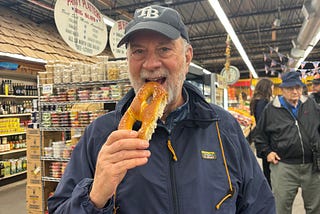 The author enjoying a soft pretzel.