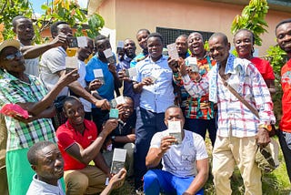 Farmers from the ABOCFA Ghana Coop enjoy chocolate made from their cacao.