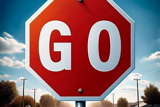 Red “stop” sign that says GO.