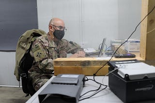 310th ESC Soldiers use biometrics to vet truck drivers sustaining Syrian ops