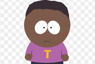 A color picture of an animated child character in an adult TV series. The child has dark skin, dark hair, is wearing a puce top with a giant “T” on it. He is shown standing with a white and grey checked background.