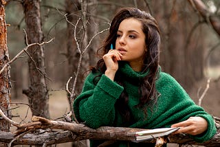 Woman in nature writing