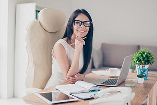 female executive thinking how to build her personal brand reputation
