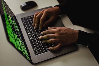 Photo by Sora Shimazaki from Pexels: https://www.pexels.com/photo/crop-cyber-spy-hacking-system-while-typing-on-laptop-5935794/