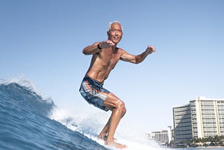 Older Man surfing