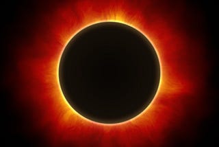 Total eclipse wiht yellow, orange, and red corona