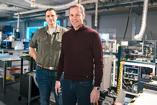 Drs. Jason Hein and Curtis Berlinguette in a self-driving chemistry lab at the University of British Columbia.