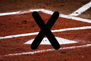 photo of home plate with an X on top