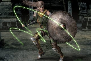 A warrior woman, dressed in animal skins, holding a shield and whipping around a magic whip.