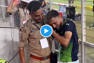 Watch] Heartbroken RCB Fan Comforted By Policeman After Loss To KKR