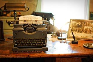 Antique typewriter as example of tools we use in writing