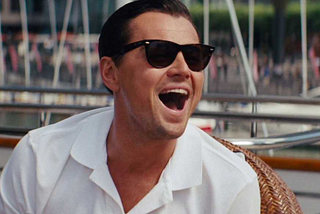 Leonardo DiCaprio laughing in the Wolf of Wall Street