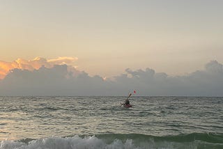 With the handkerchief dropped