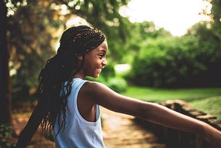 Black kid smiling.