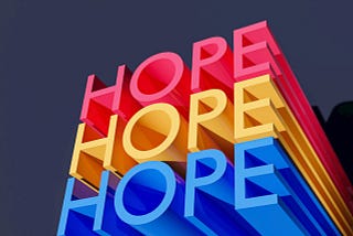 “Hope” written in blue, yellow, red