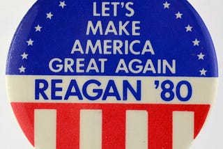 A button from Ronald Reagan’s 1980 U.S. presidential campaign. It bears the slogan “Let’s Make America Great Again”