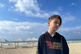 Aviv, age 11, at the beach.