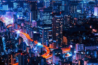 a photo of a cityscape at night time