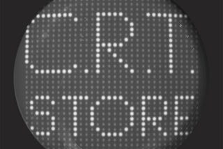 Rounded screen showing “C.R.T. STORE” on a 32x32 grid of pixels.