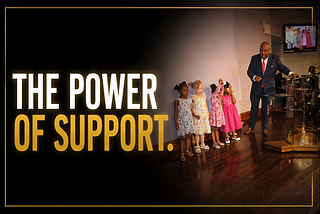Dominic Carter speaking with young girls at a Brooklyn church about mentorship, support, and foster care advocacy
