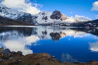 A lake with snowy mountain and blue sky at Tawang Arunachal Pradesh India