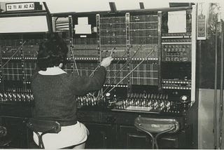 Vintage photography of a telephone switchboard to highlight how designers are only facilitating interactions between stakeholders