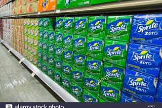 Sprite on a shelf in a grocery store.