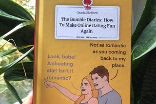 The author holding up “The Bumble Diaries: How to Make online dating fun again” in front of her house plants