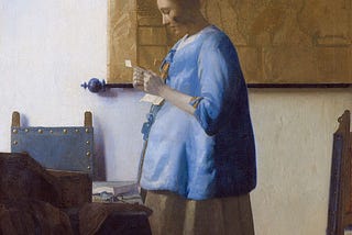 A painting of a woman in blue reading a letter.