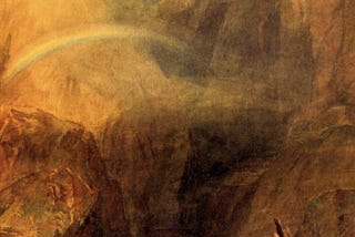 This is a photo of a painting by J.M.W. Turner from the 1800’s called “The Devil’s Bridge, St. Gothard.” It’s a blurry landscape mostly made up of rocky mountains with a stream running through it and a rainbow over the stream.