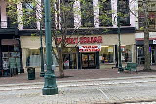 Family Dollar storefront in Downtown Memphis with “Store Closing” sign, spring 2021