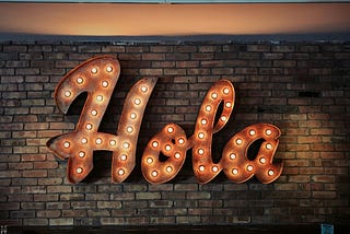 Picture of the Spanish word “Hola” which means hello in English.