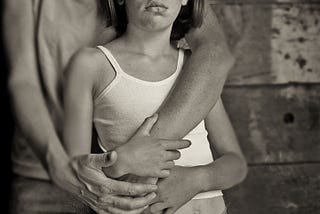 Why do Americans neglect their poor children?