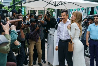 Antonio and Olivia arrive at a restaurant for lunch surrounded by paparazzi photographers